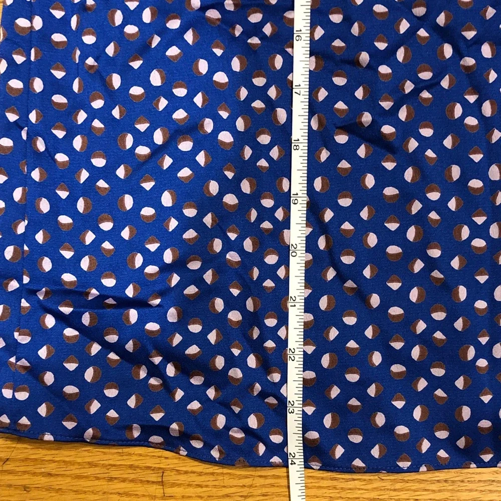 Authentic kate spade NWOT Blue top with design